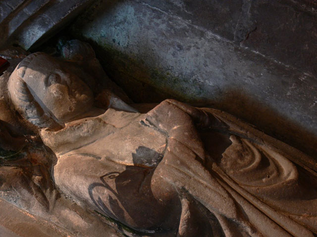 Mid C14 effigy of priest