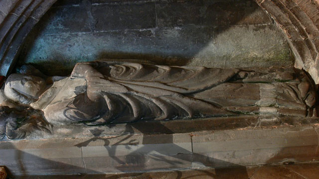 Mid C14 effigy of priest